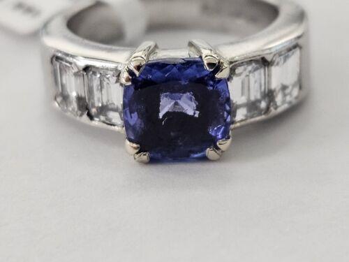 Platinum ring featuring a 1.79-carat tanzanite gemstone and 1.60-carat diamond accents, elegant and sparkling jewelry piece