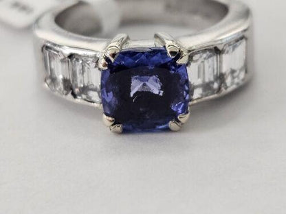 Platinum ring featuring a 1.79-carat tanzanite gemstone and 1.60-carat diamond accents, elegant and sparkling jewelry piece