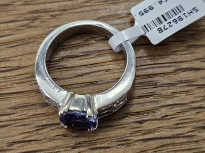 Platinum ring featuring a 1.79-carat tanzanite center stone and 1.60-carat diamond accents, elegant and sparkling jewelry piece