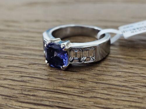 Platinum ring featuring a 1.79-carat tanzanite center stone and 1.60-carat diamond accents, elegant and finely crafted jewelry piece