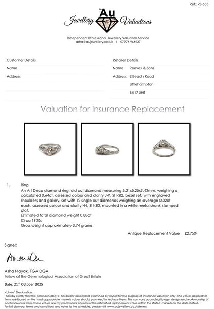 Platinum art deco diamond ring with intricate geometric design and sparkling diamonds, showcasing elegant craftsmanship.