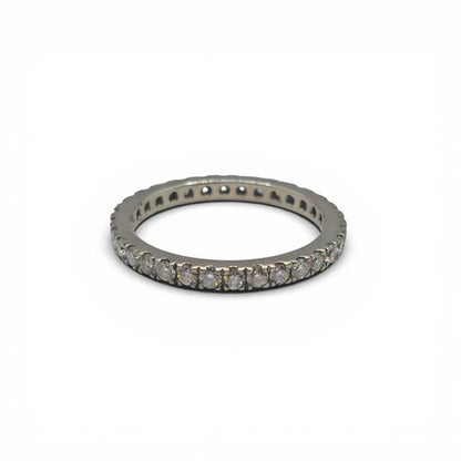 Platinum full diamond eternity ring with sparkling round-cut diamonds, showcasing a continuous circle of brilliance.