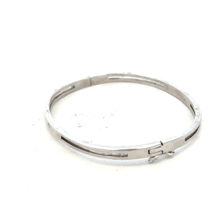 Silver bangle weighing 13.5g, featuring a sleek, polished design, perfect for everyday or special occasions.