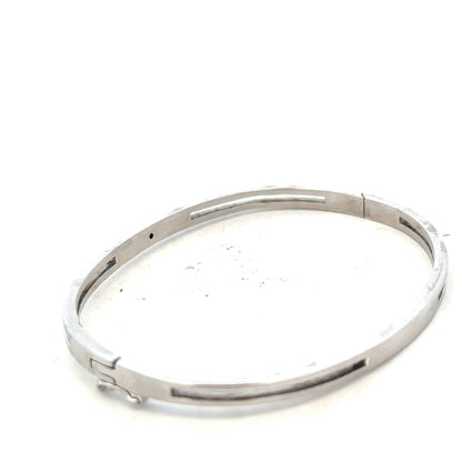 Silver bangle weighing 13.5g with a sleek, polished finish, designed for elegant wristwear.