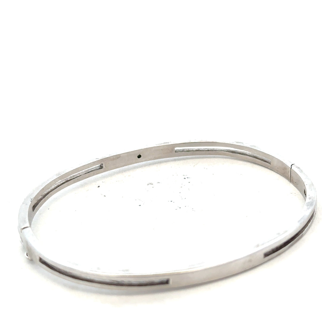 Silver bangle weighing 13.5g with a sleek, polished finish, featuring a simple, elegant design perfect for everyday wear.