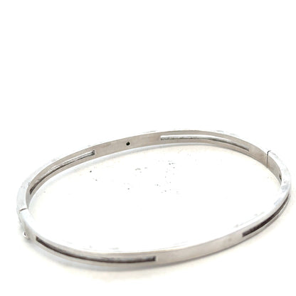 Silver bangle weighing 13.5g with a sleek, polished finish, featuring a simple, elegant design perfect for everyday wear.
