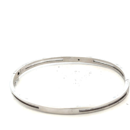 Silver bangle weighing 13.5g with a smooth, polished finish, perfect for stylish jewelry wear.