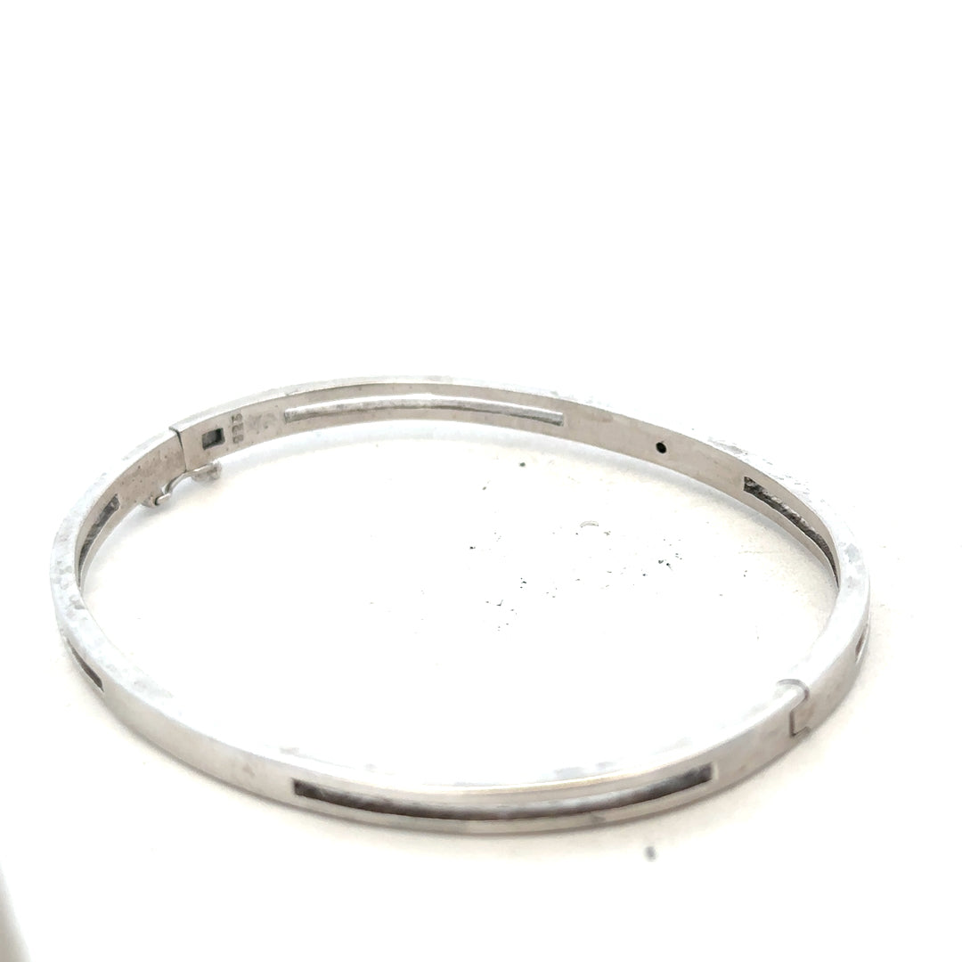 Silver bangle weighing 13.5g with a smooth, polished finish, suitable for everyday wear.