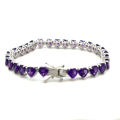 Silver bracelet weighing 14.7g with a sleek, polished design, displayed on a neutral background.