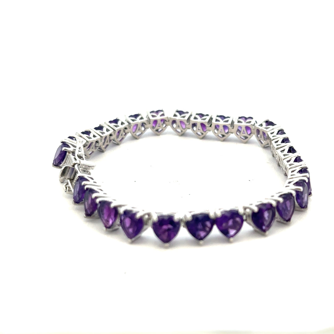 Silver bracelet weighing 14.7g with a sleek, polished finish, featuring a modern unbranded design.