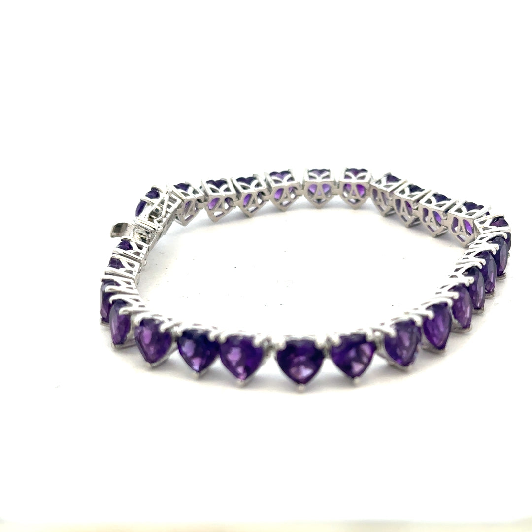 Silver bracelet weighing 14.7g with a sleek, polished design, ideal for stylish everyday wear.