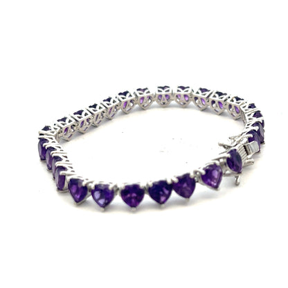 Silver bracelet weighing 14.7g with a sleek, polished design, perfect for casual or formal wear.