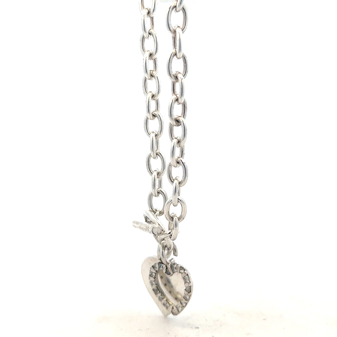 Silver bracelet weighing 19.5g with intricate design, crafted by an unbranded manufacturer, shown in the image.