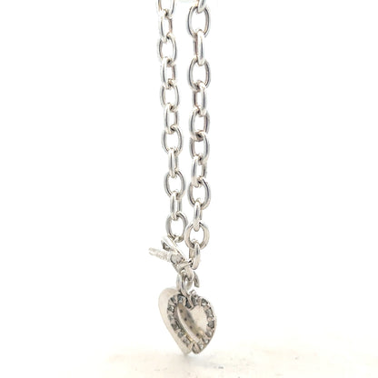 Silver bracelet weighing 19.5g with intricate design, crafted by an unbranded manufacturer, shown in the image.
