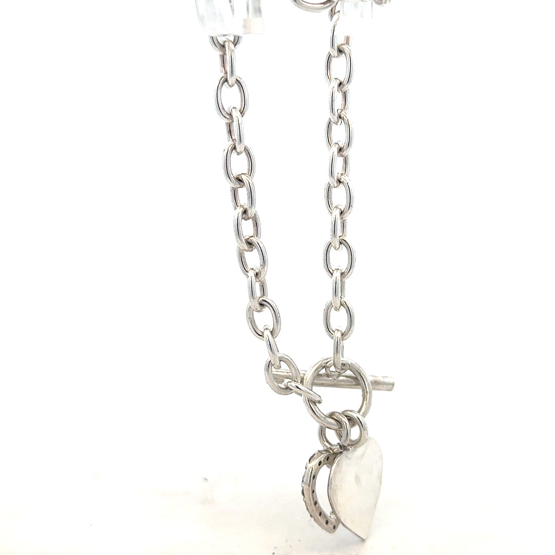 Silver bracelet weighing 19.5 grams with intricate design, unbranded jewelry accessory worn on the wrist.