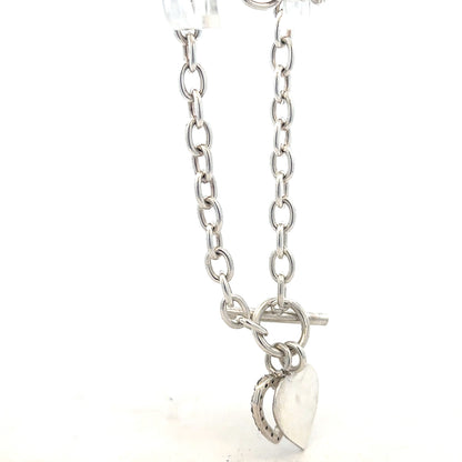Silver bracelet weighing 19.5 grams with intricate design, unbranded jewelry accessory worn on the wrist.