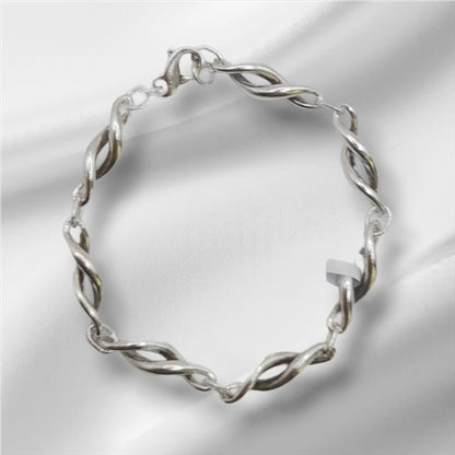 Silver bracelet, 19cm length, lightweight 14.4g, unbranded jewelry with a sleek, polished design.