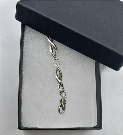 Silver bracelet, 19cm length, 14.4g, unbranded, with a sleek, polished design perfect for everyday wear