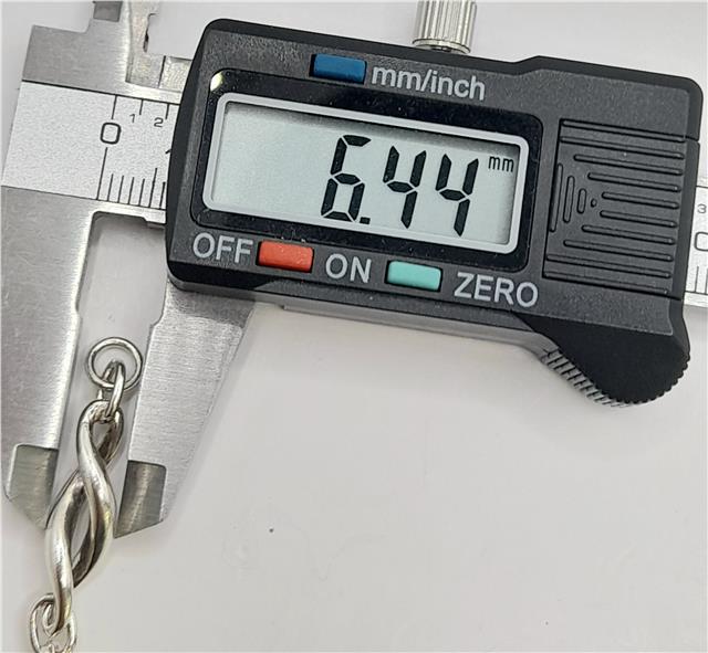 Silver bracelet, 19cm length, 14.4g, unbranded jewelry, shiny metal with a smooth, sleek design.
