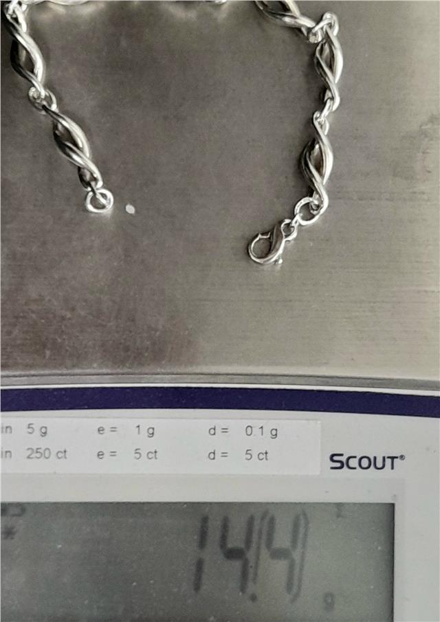 Silver bracelet, 19cm length and 14.4g weight, showcasing a sleek, unbranded jewelry design with a polished finish.