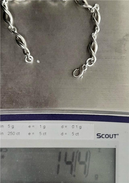 Silver bracelet, 19cm length and 14.4g weight, showcasing a sleek, unbranded jewelry design with a polished finish.