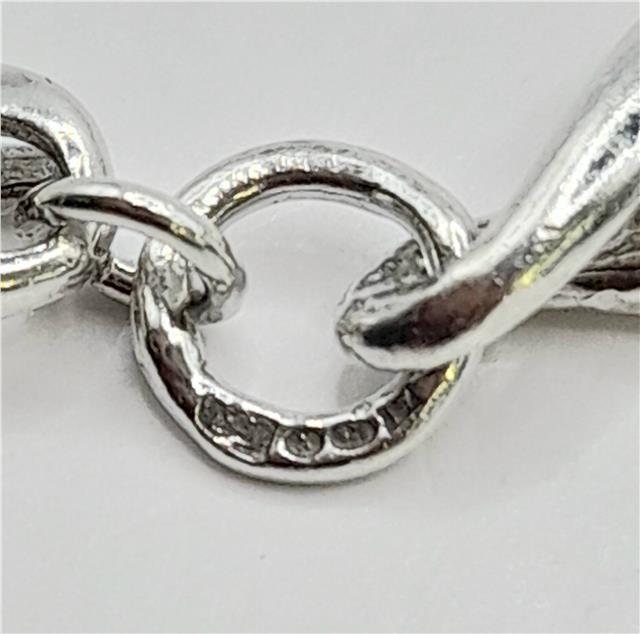 Silver bracelet, 19cm length, 14.4g, unbranded, with a sleek polished finish, displayed on a neutral background.