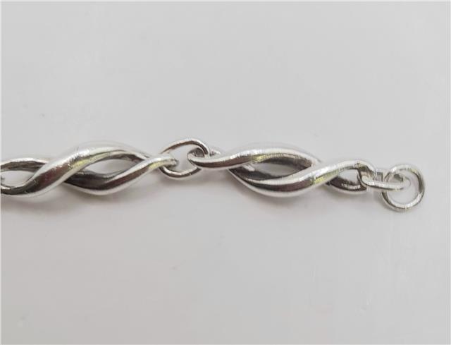 Silver bracelet 19cm weight 14.4g, unbranded, featuring sleek design and polished finish, shown on a neutral background.