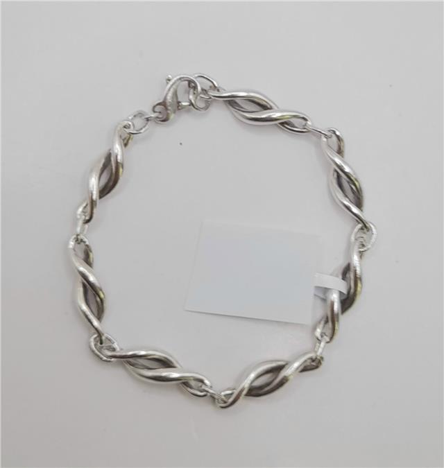 Silver bracelet measuring 19cm and weighing 14.4g, featuring a sleek unbranded design, shown on a plain background.