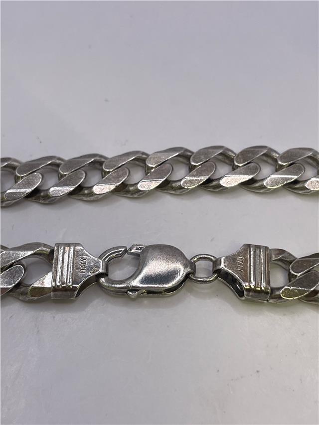 Silver bracelet, 34.5g, featuring a sleek design, crafted with polished silver metal, perfect for stylish accessorizing.