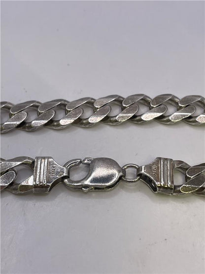 Silver bracelet, 34.5g, featuring a sleek design, crafted with polished silver metal, perfect for stylish accessorizing.