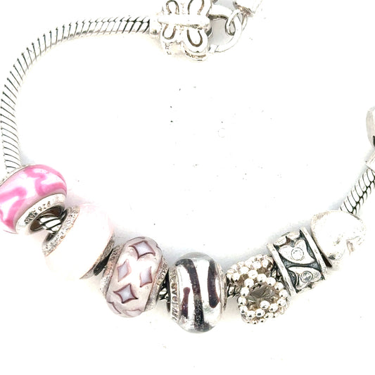 Silver bracelet weighing 37g with intricate design, unbranded jewelry piece shown on a neutral background.