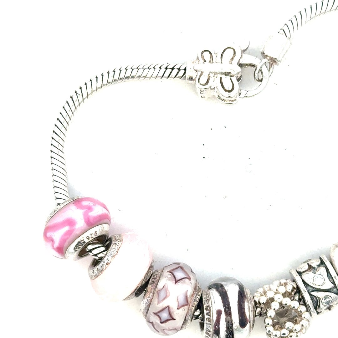 Silver bracelet weighing 37g with intricate design, crafted from unbranded metal, shown on a plain background.