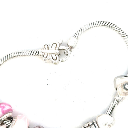 Silver bracelet weighing 37g with intricate design, unbranded jewelry piece shown on a plain background.