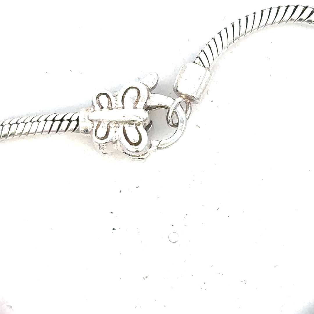 Silver bracelet weighing 37g with intricate design, featuring a sleek and polished finish, ideal for stylish accessories.