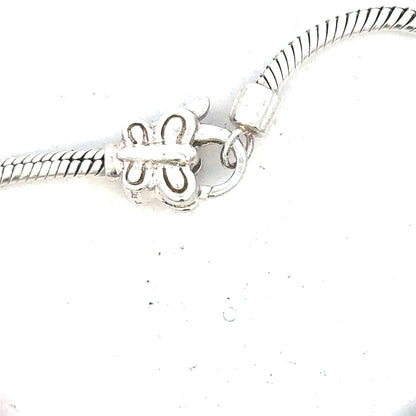 Silver bracelet weighing 37g with intricate design, featuring a sleek and polished finish, ideal for stylish accessories.