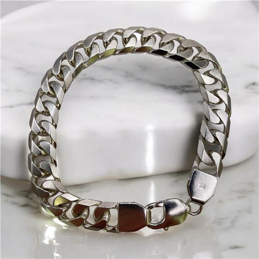 Silver bracelet weighing 47g with intricate design, crafted from unbranded sterling silver, displayed on a neutral background.
