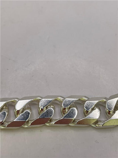 Silver bracelet weighing 47g with intricate design, featuring a sleek and polished finish, perfect for stylish accessories.