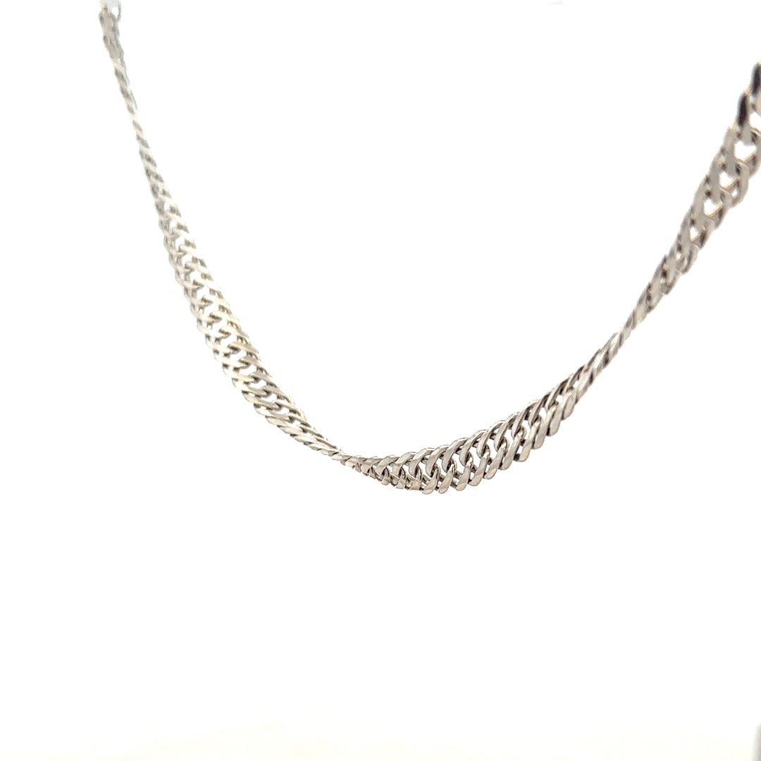 Silver chain weighing 17.2g, unbranded jewelry piece with a detailed link design, displayed against a plain background.