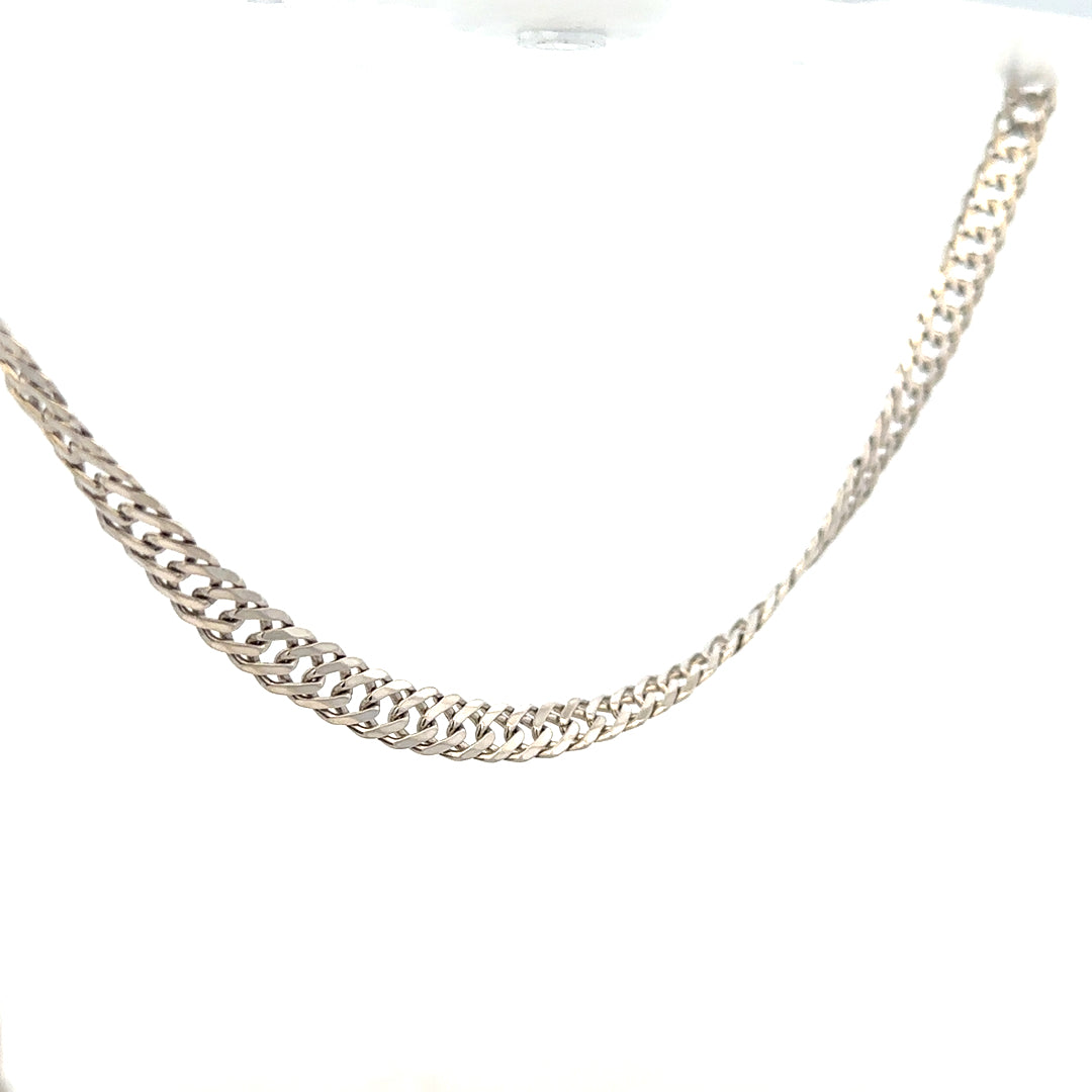 Silver chain weighing 17.2g, unbranded, with a detailed link design, shown lying flat on a neutral background.