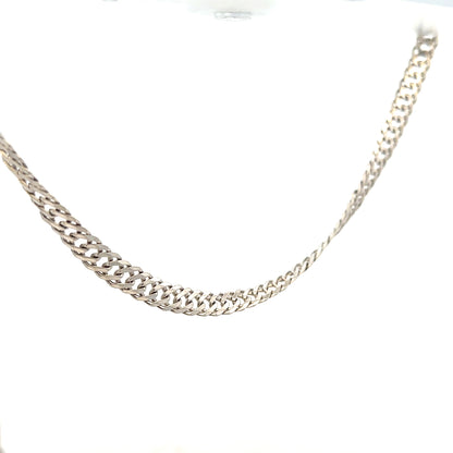 Silver chain weighing 17.2g, unbranded, with a detailed link design, shown lying flat on a neutral background.