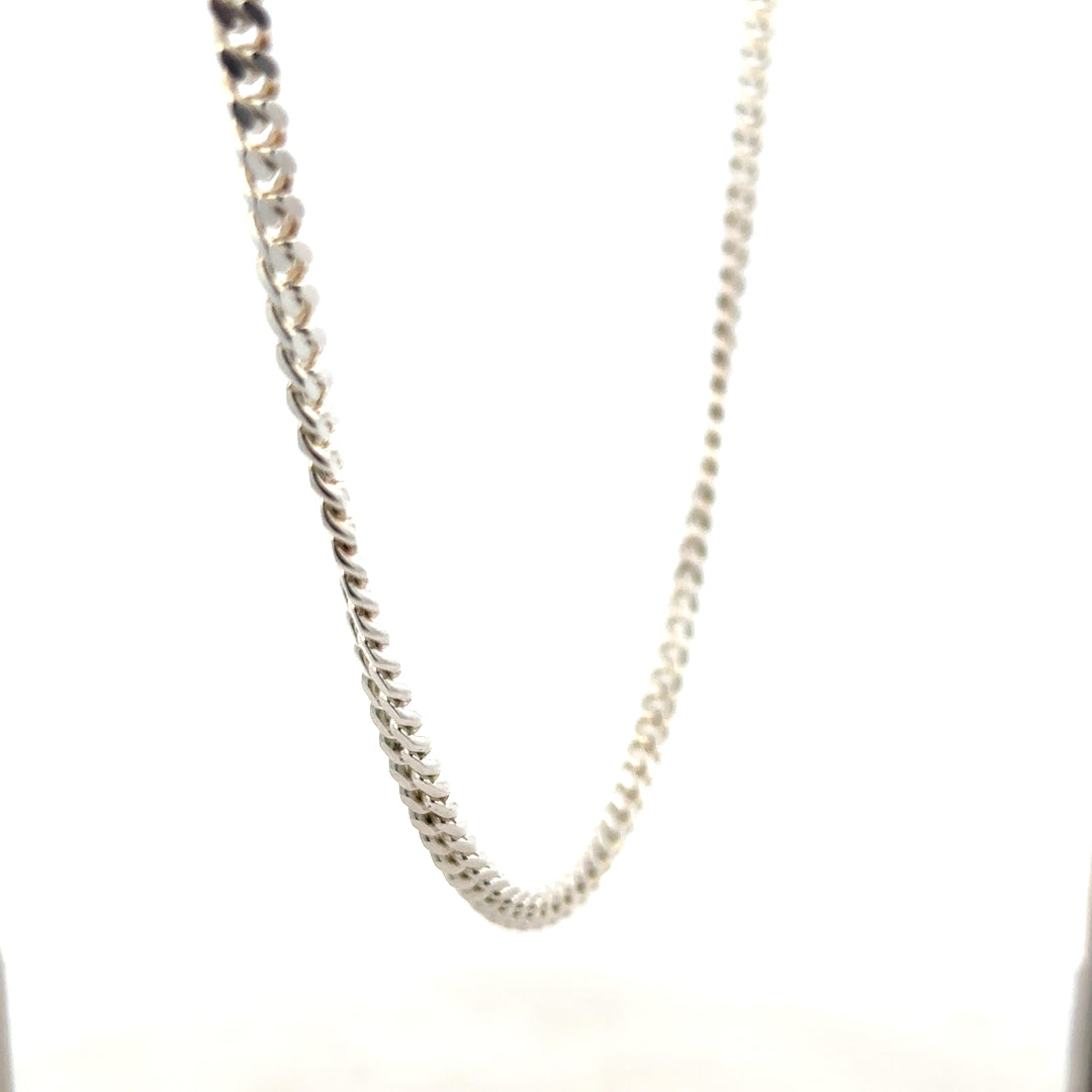 Silver chain weighing 24.9g with a sleek design, perfect for everyday wear or layered jewelry styles.