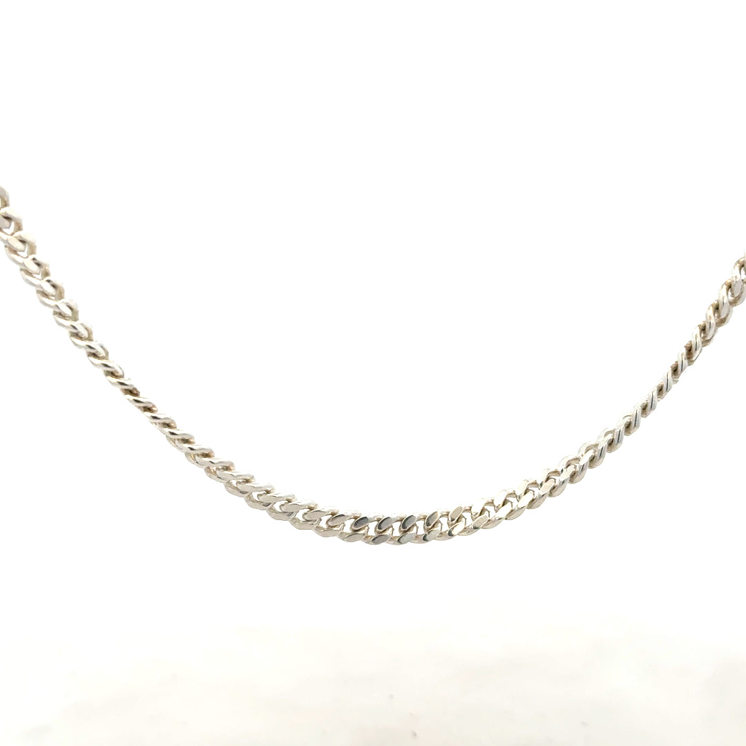 Silver chain weighing 24.9g, unbranded jewelry piece with a sleek, polished finish, displayed against a neutral background.