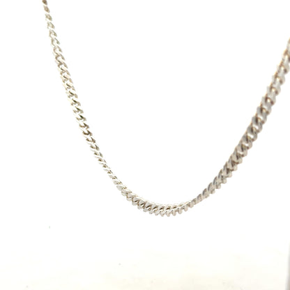 Silver chain weighing 24.9g with a sleek design, perfect for jewelry or accessories, unbranded and displayed clearly.