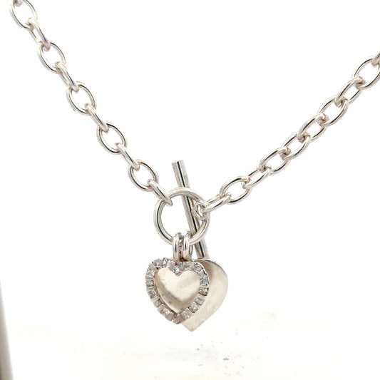 Silver chain weighing 32.4g with intricate links, unbranded jewelry accessory, displayed on a neutral background.