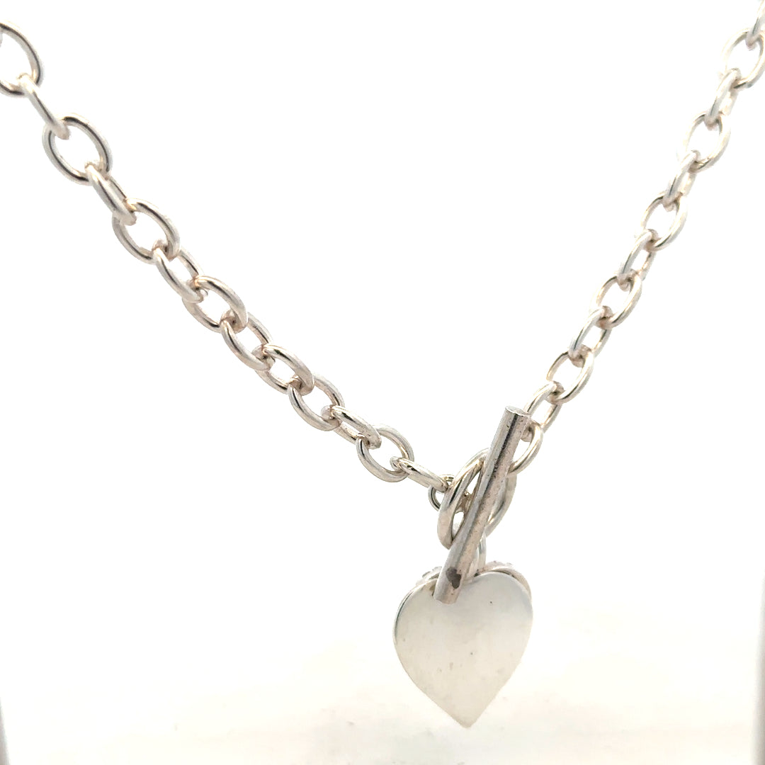Silver chain weighing 32.4g, unbranded jewelry piece, featuring a detailed chain link design.
