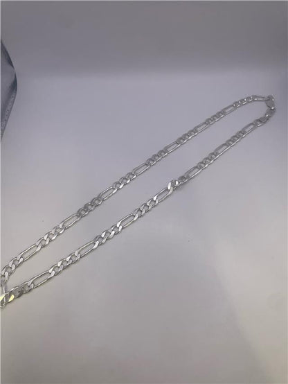 Silver chain weighing 31.5g with a sleek design, featuring detailed links, perfect for casual or elegant jewelry styles.