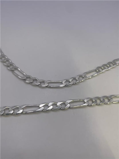 Silver chain weighing 31.5g, featuring a sleek, unbranded design with a classic link style.