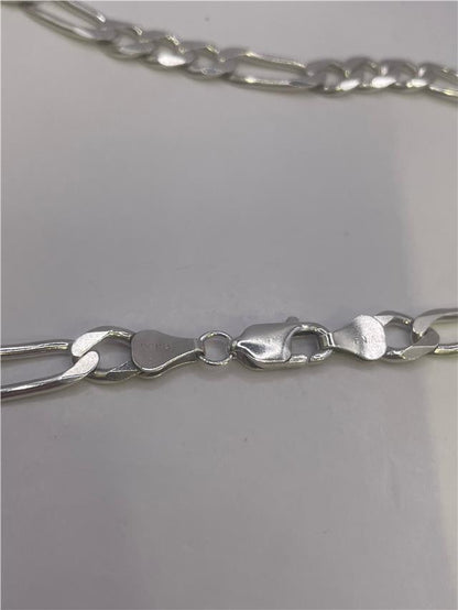 Silver chain weighing 31.5g, crafted with a smooth link design, perfect for stylish jewelry or accessory wear.