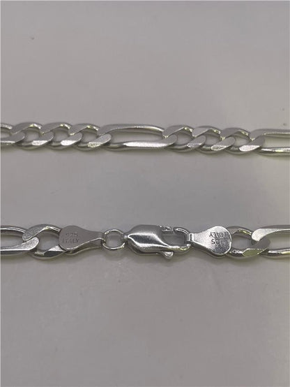 Silver chain weighing 31.5g with intricate link design, unbranded jewelry accessory, shown on a plain background.