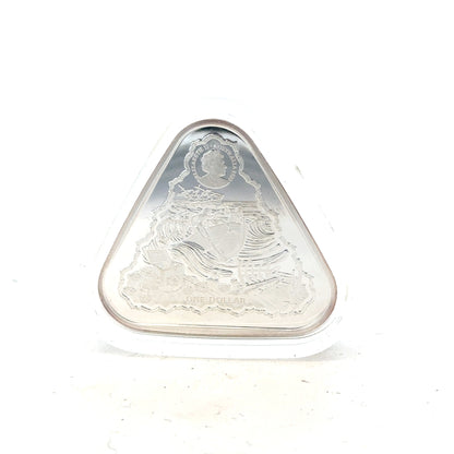 Silver coin weighing 31.8g with a detailed design, unbranded, featuring intricate engravings and a shiny metallic surface.